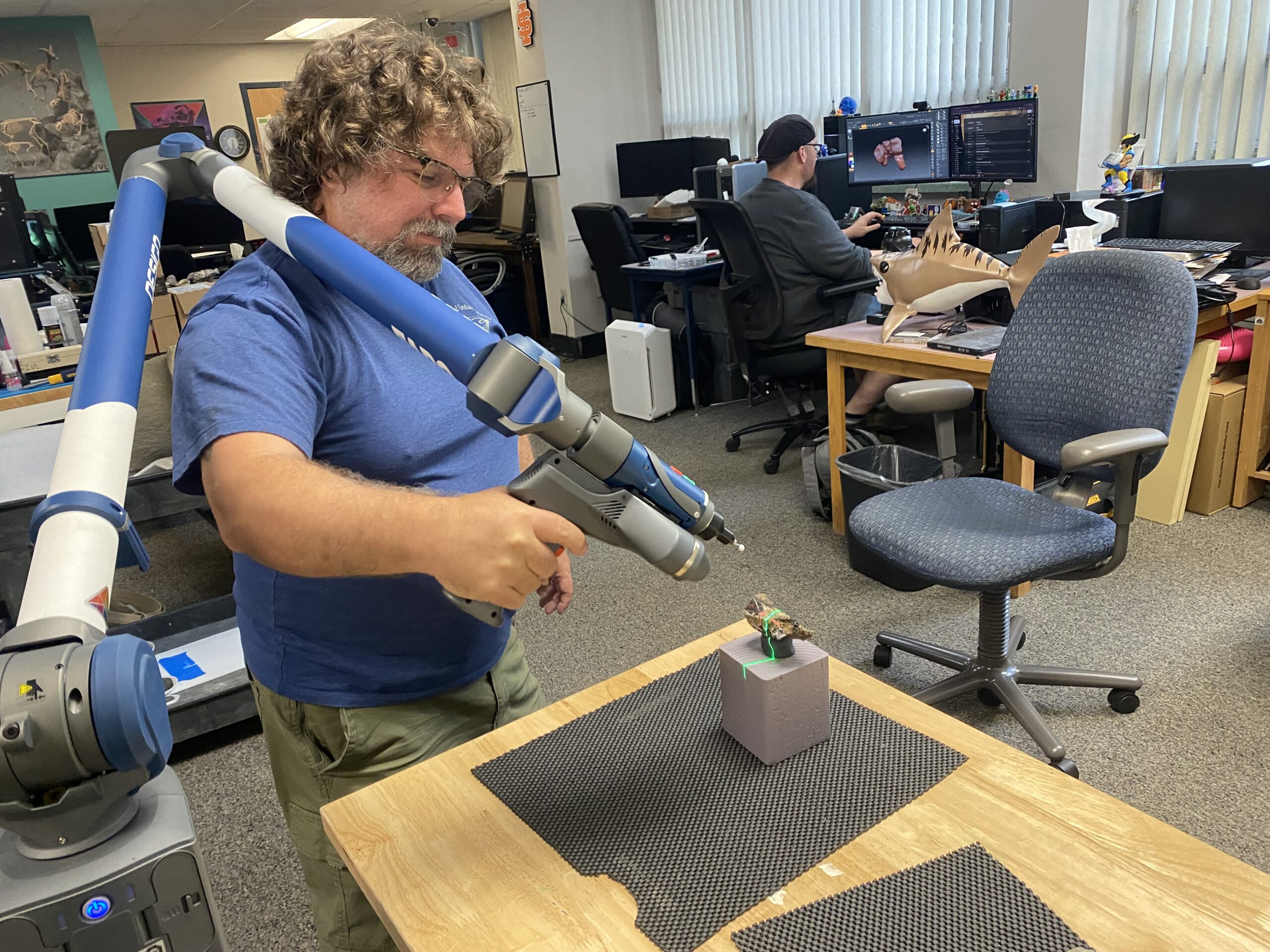 Idaho Museum of Natural History Education Manager Robert Gay 3D-scanning a fossil using a FARO laser scanner.